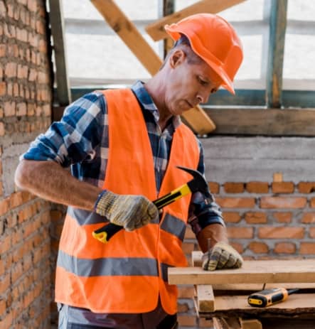 construction worker with inflammatory arthritis at a job site